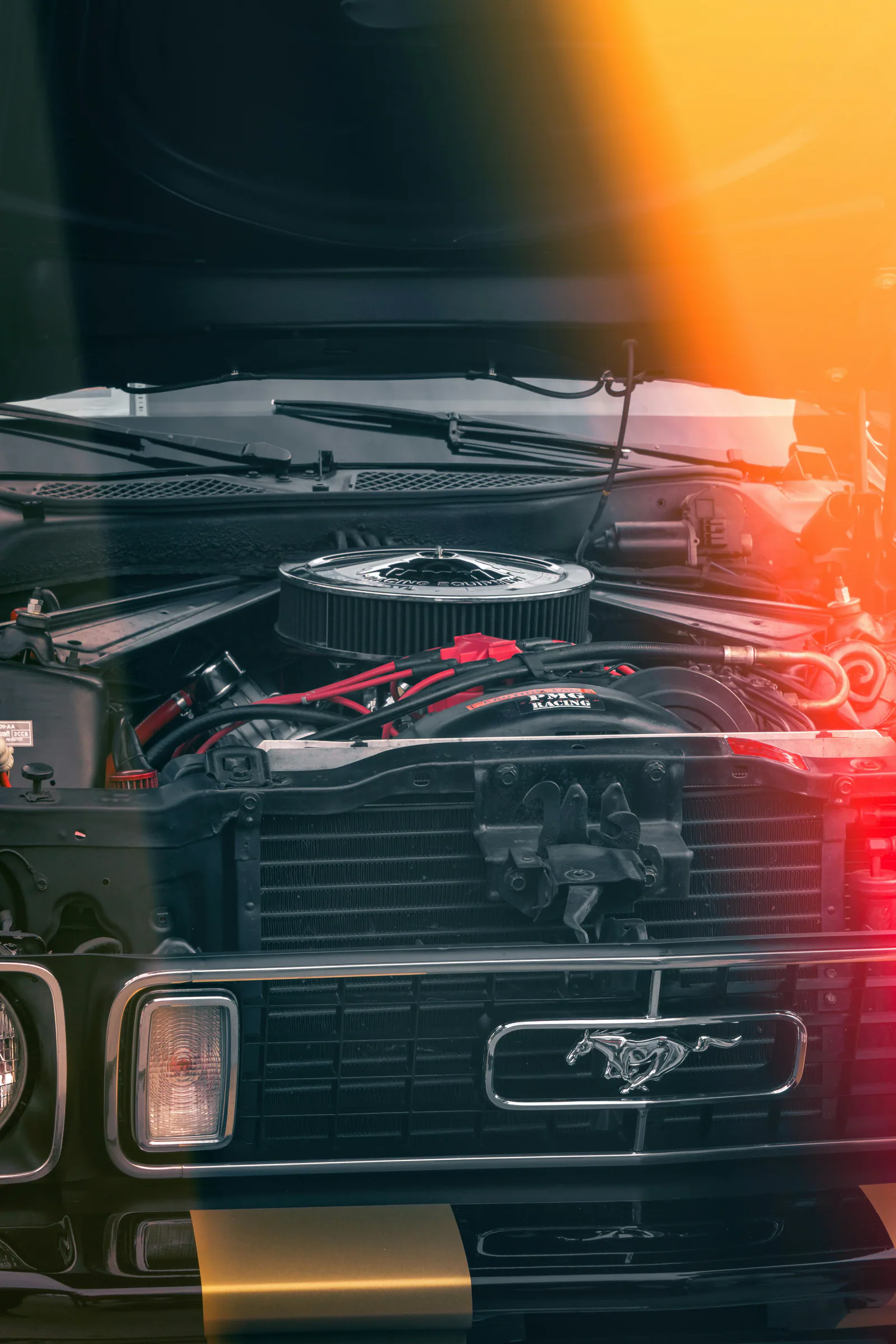 Illustration of an alternator in a car engine bay